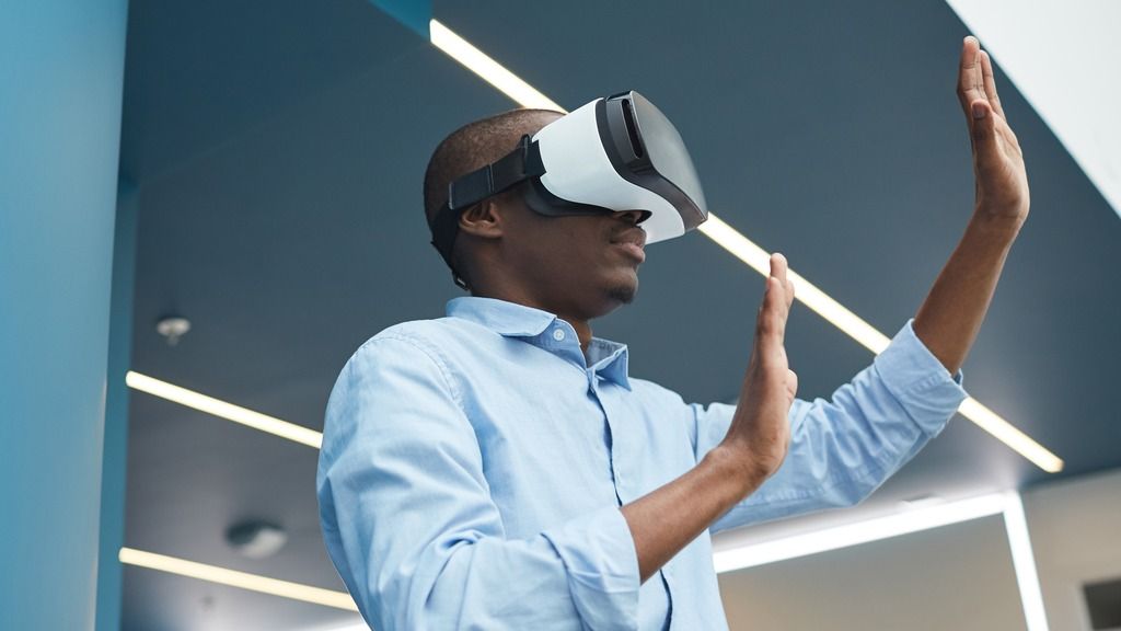 Person testing a device with VR glasses